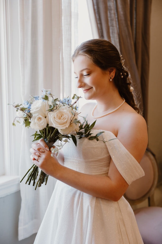 Rachel & Elliott's elegant wedding at the historic Winchester Opera House in Winchester, Kentucky, captured by Kentucky wedding photographer A Pair of Perry's Photography, featuring classic decor and romantic details.