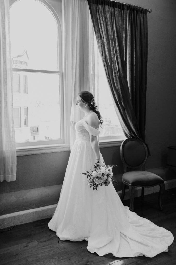 Rachel & Elliott's elegant wedding at the historic Winchester Opera House in Winchester, Kentucky, captured by Kentucky wedding photographer A Pair of Perry's Photography, featuring classic decor and romantic details.