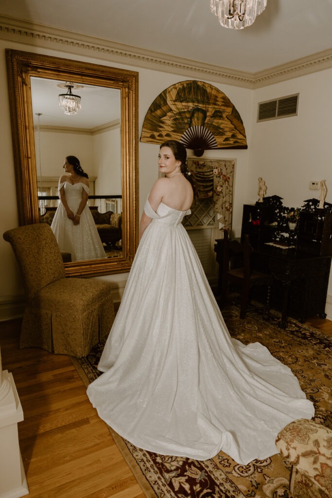 Rachel & Elliott's elegant wedding at the historic Winchester Opera House in Winchester, Kentucky, captured by Kentucky wedding photographer A Pair of Perry's Photography, featuring classic decor and romantic details.