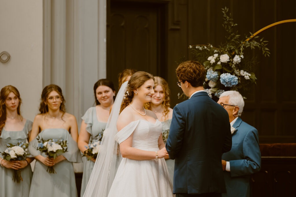 Rachel & Elliott's elegant wedding at the historic Winchester Opera House in Winchester, Kentucky, captured by Kentucky wedding photographer A Pair of Perry's Photography, featuring classic decor and romantic details.