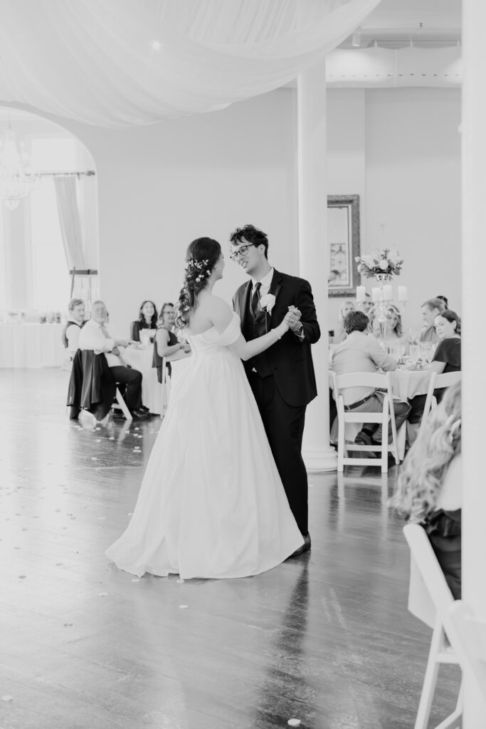 Rachel & Elliott's elegant wedding at the historic Winchester Opera House in Winchester, Kentucky, captured by Kentucky wedding photographer A Pair of Perry's Photography, featuring classic decor and romantic details.