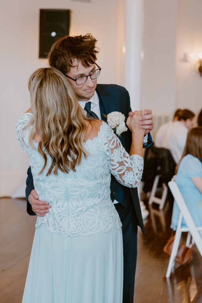 Rachel & Elliott's elegant wedding at the historic Winchester Opera House in Winchester, Kentucky, captured by Kentucky wedding photographer A Pair of Perry's Photography, featuring classic decor and romantic details.