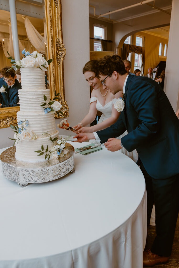 Rachel & Elliott's elegant wedding at the historic Winchester Opera House in Winchester, Kentucky, captured by Kentucky wedding photographer A Pair of Perry's Photography, featuring classic decor and romantic details.