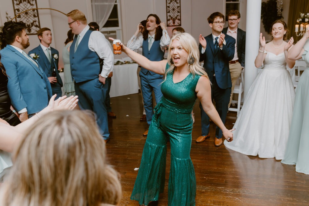 Rachel & Elliott's elegant wedding at the historic Winchester Opera House in Winchester, Kentucky, captured by Kentucky wedding photographer A Pair of Perry's Photography, featuring classic decor and romantic details.