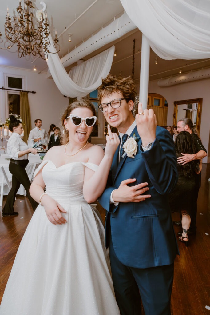 Rachel & Elliott's elegant wedding at the historic Winchester Opera House in Winchester, Kentucky, captured by Kentucky wedding photographer A Pair of Perry's Photography, featuring classic decor and romantic details.