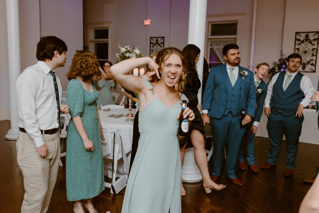 Rachel & Elliott's elegant wedding at the historic Winchester Opera House in Winchester, Kentucky, captured by Kentucky wedding photographer A Pair of Perry's Photography, featuring classic decor and romantic details.