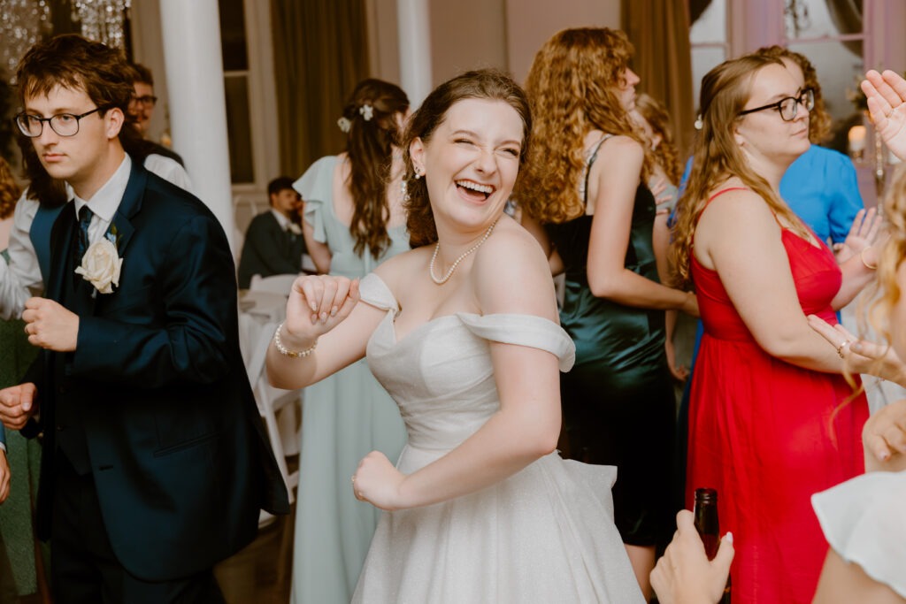 Rachel & Elliott's elegant wedding at the historic Winchester Opera House in Winchester, Kentucky, captured by Kentucky wedding photographer A Pair of Perry's Photography, featuring classic decor and romantic details.